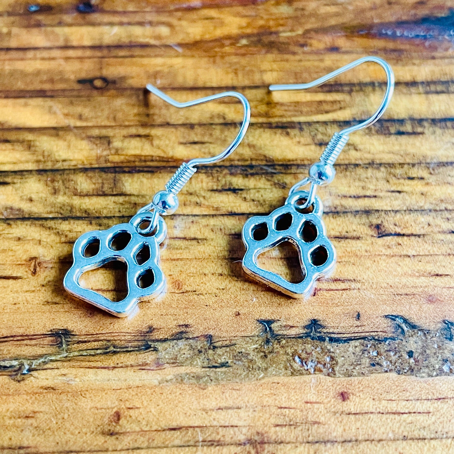 Animal paw shaped charm pierced earrings