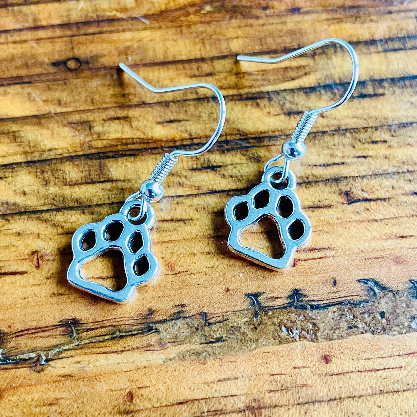 Animal paw shaped charm pierced earrings