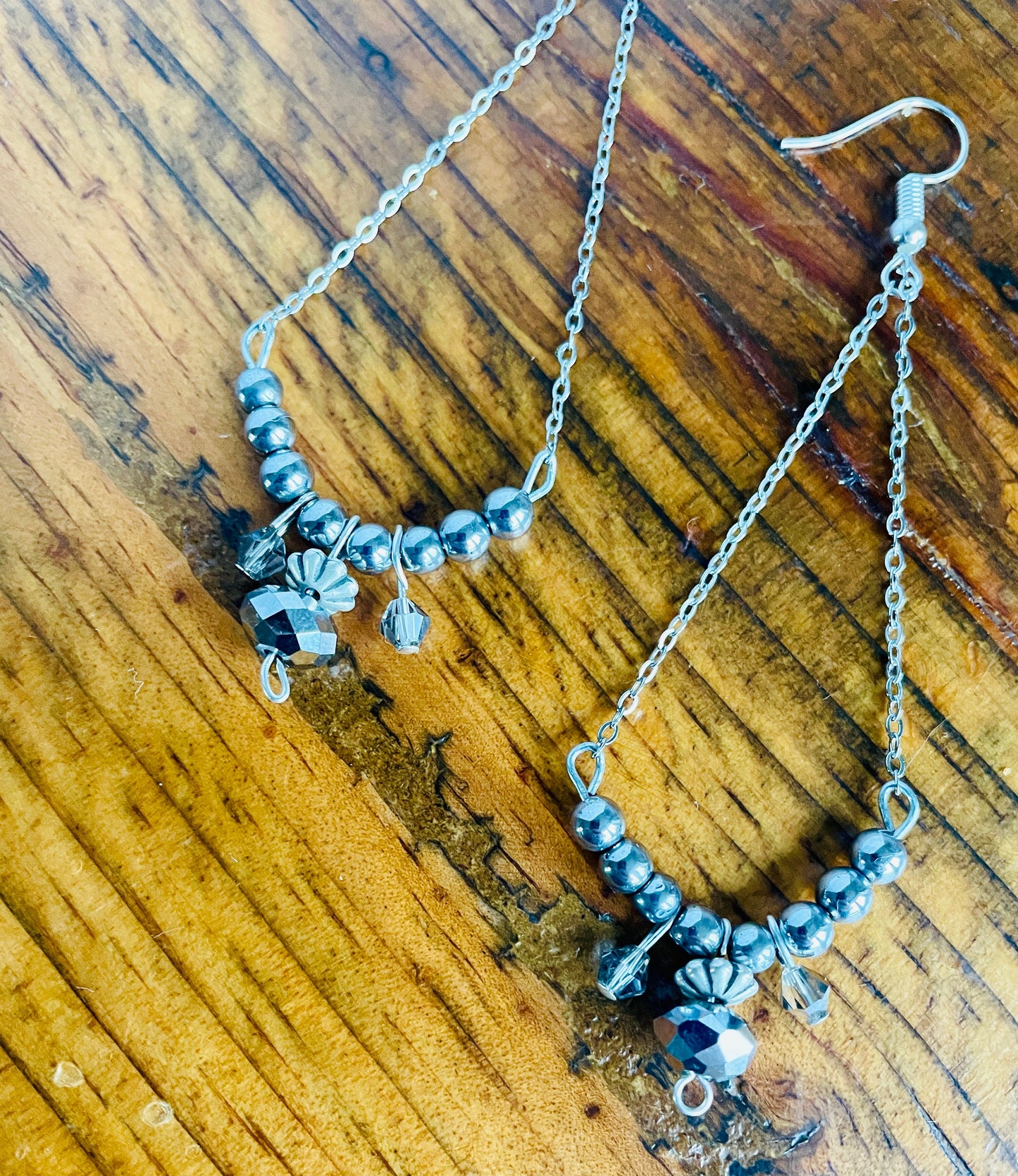 Beaded grey chrome chandelier earrings.  One of a kind.