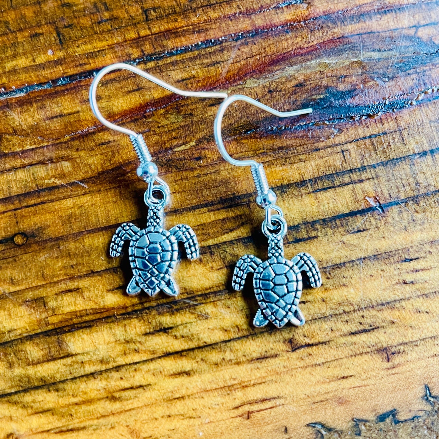 Turtle shaped charm pierced earrings