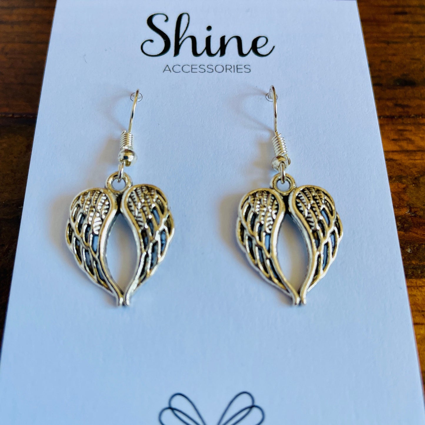 Angel wing shaped charm pierced earrings